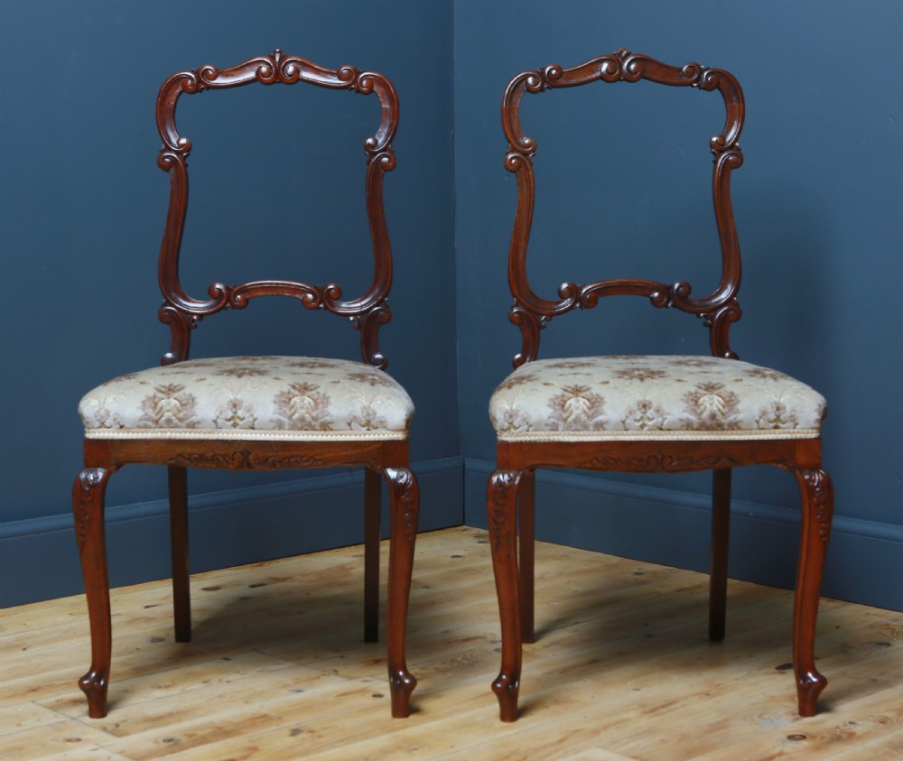 attractive pair of vintage ornate carved oak bedroom side chairs