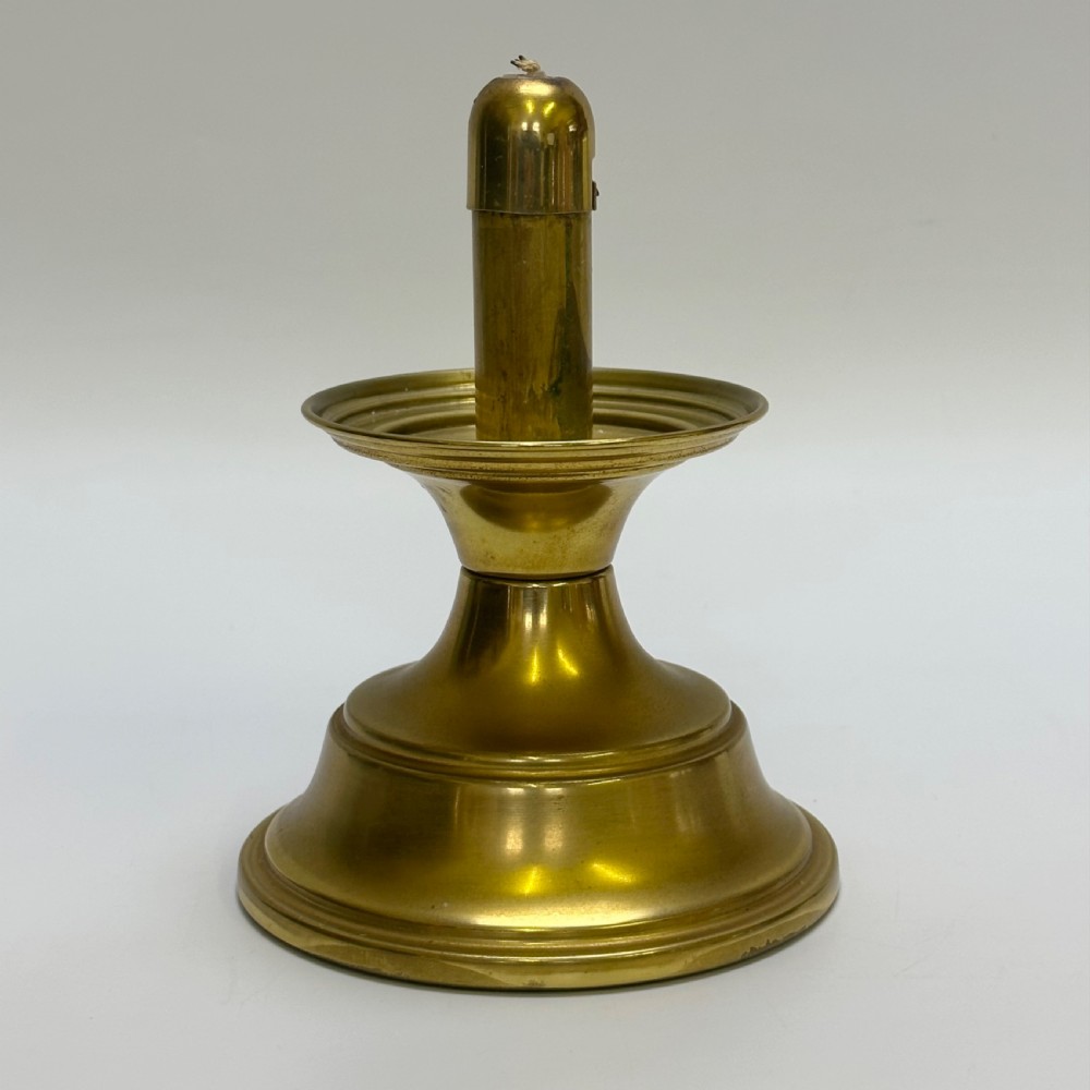 attractive vintage brass sprung weighted base candlestick