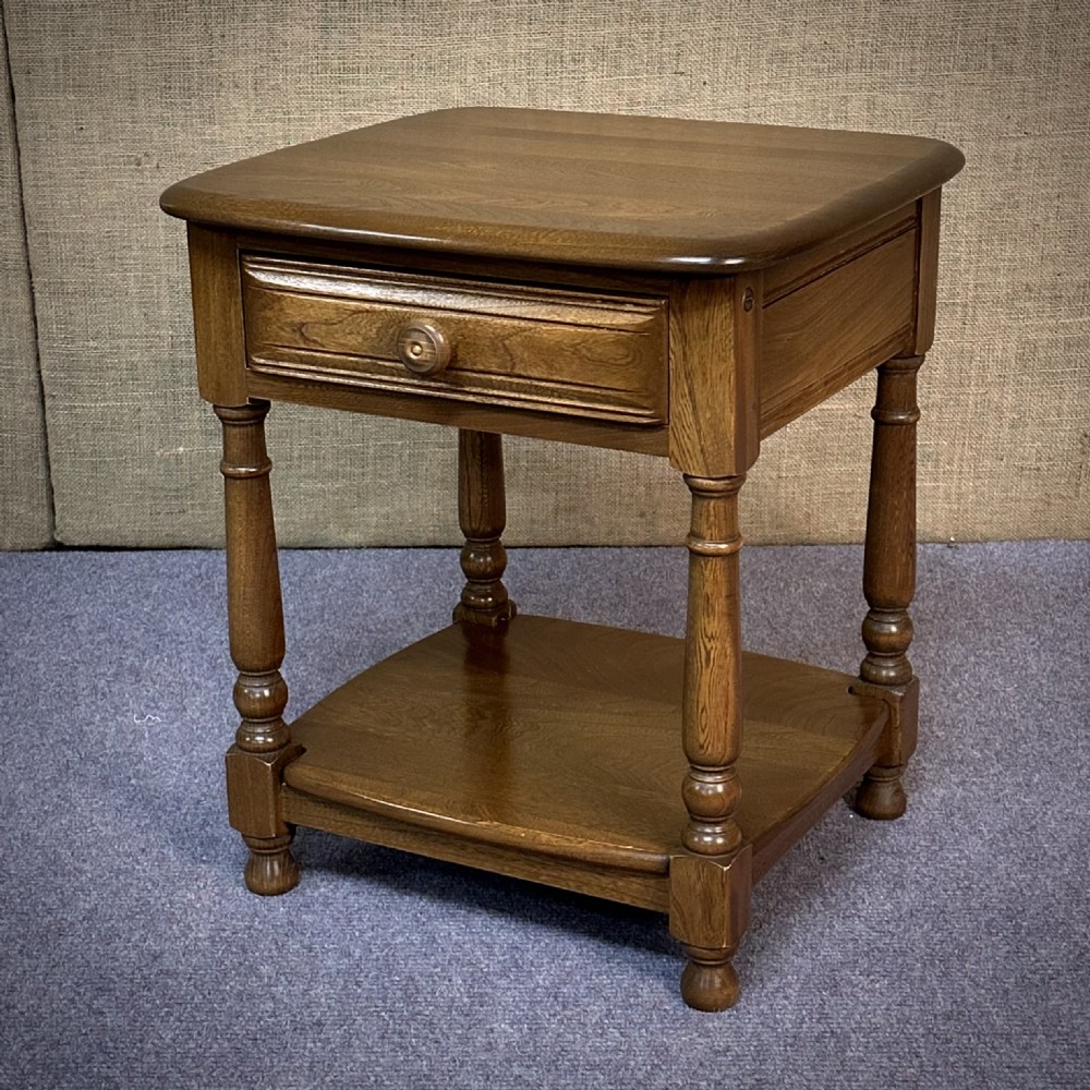 attractive ercol elm golden dawn lamp side table with drawer