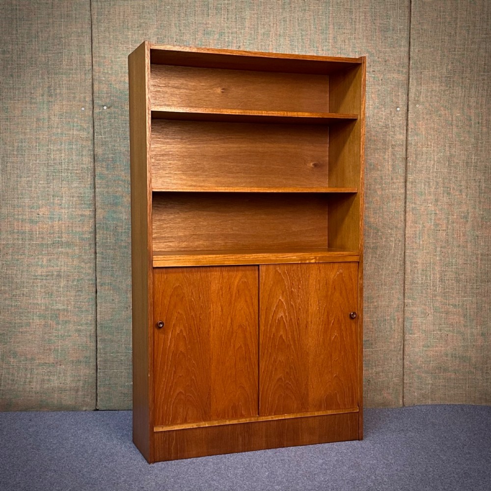 vintage mid century teak sliding door bookcase cabinet
