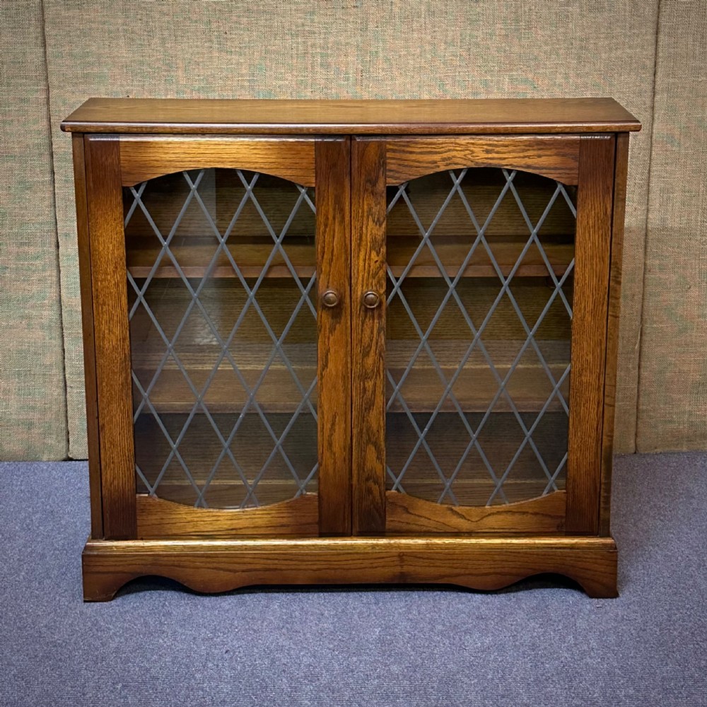 attractive small vintage lead glazed oak two door bookcase
