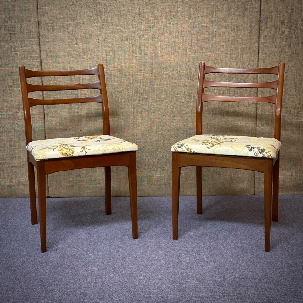 attractive pair of stylish mid century teak dining chairs
